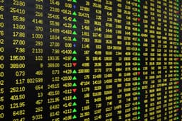 Major Stocks Including IBEX, Tesla, IonQ, and Warner Bros. Discovery Rise on Friday