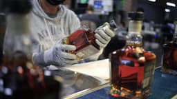 Midday Stock Highlights: Notable Movements from EchoStar, Brown-Forman, Semtech, Oklo, and Others